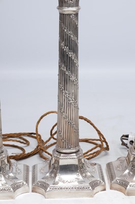 Lot 57 - A SET OF FOUR LATE 20TH CENTURY ENGLISH SILVER CORINTHIAN COLUMN TABLE LAMPS