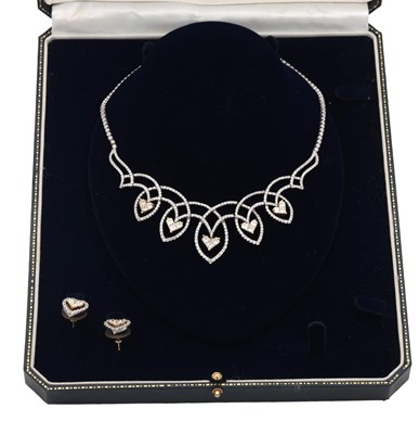 Lot 141 - AN 18CT YELLOW AND WHITE GOLD DIAMOND HEART MOTIF NECKLACE AND EARRING SET