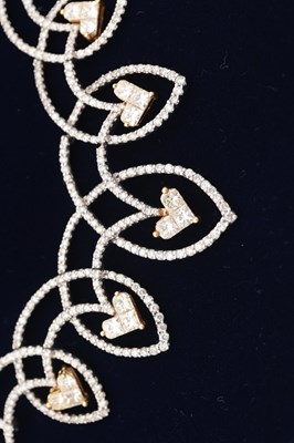 Lot 141 - AN 18CT YELLOW AND WHITE GOLD DIAMOND HEART MOTIF NECKLACE AND EARRING SET