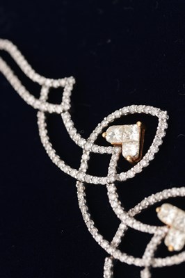 Lot 141 - AN 18CT YELLOW AND WHITE GOLD DIAMOND HEART MOTIF NECKLACE AND EARRING SET