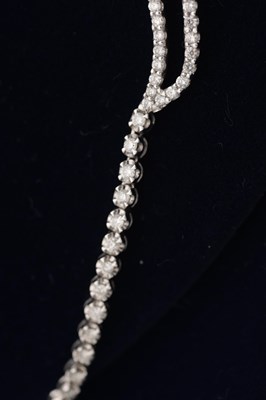 Lot 141 - AN 18CT YELLOW AND WHITE GOLD DIAMOND HEART MOTIF NECKLACE AND EARRING SET