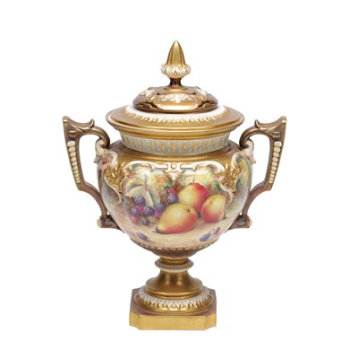 Lot 622 - H AYRTON A ROYAL WORCESTER PORCELAIN FRUIT PAINTED TWO HANDLED PEDESTAL VASE AND COVER