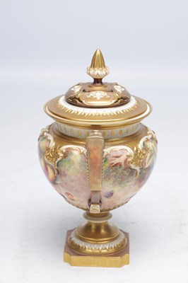 Lot 622 - H AYRTON A ROYAL WORCESTER PORCELAIN FRUIT PAINTED TWO HANDLED PEDESTAL VASE AND COVER
