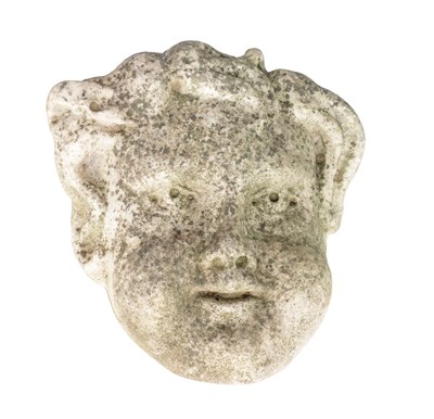 Lot 1079 - A CARVED MARBLE CHERUB'S HEAD