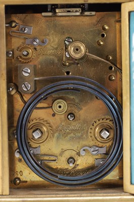 Lot 1195 - A LATE 19TH CENTURY FRENCH GILT BRASS AND PORCELAIN PANEL PETITE SONNERIE REPEATING CARRIAGE CLOCK