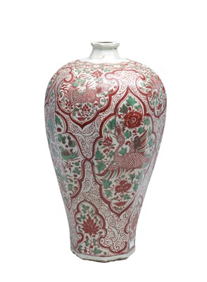 Lot 821 - A CHINESE ROUGE-DE-FER AND GREEN ENAMELLED FACETED MEIPING VASE WITH OGIVAL PANELS OF PHOENIX AND PEONY