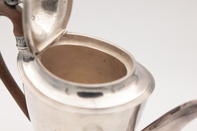 Lot 22 - A GEORGE III ENGLISH PROVINCIAL SILVER COFFEE POT BY HAMPSTON, PRINCE & CATTLES, YORK