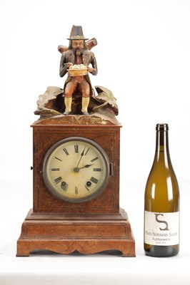 Lot 1321 - A RARE 19TH CENTURY BLACK FOREST FIGURED WALNUT AUTOMATON "DUMPLING EATER" MANTEL CLOCK