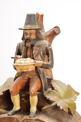 Lot 1321 - A RARE 19TH CENTURY BLACK FOREST FIGURED WALNUT AUTOMATON "DUMPLING EATER" MANTEL CLOCK