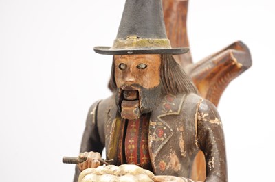 Lot 1321 - A RARE 19TH CENTURY BLACK FOREST FIGURED WALNUT AUTOMATON "DUMPLING EATER" MANTEL CLOCK