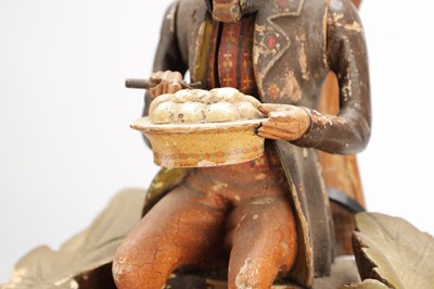 Lot 1321 - A RARE 19TH CENTURY BLACK FOREST FIGURED WALNUT AUTOMATON "DUMPLING EATER" MANTEL CLOCK