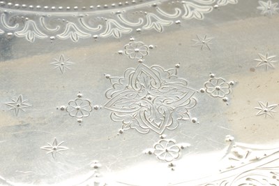 Lot 138 - A LARGE VICTORIAN ENGLISH SILVER TWO-HANDLED TRAY