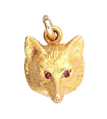 Lot 216 - A 9CT GOLD FOX MASK PENDANT