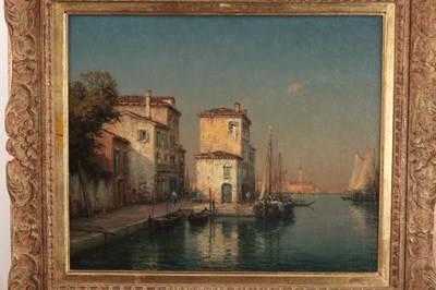 Lot 973 - BOUVARD AN OIL ON CANVAS VENETIAN CANAL SCENE