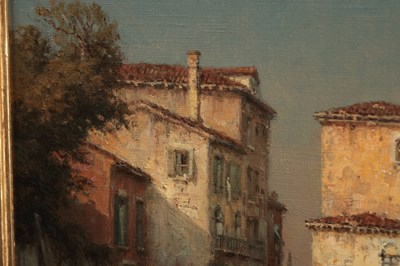 Lot 973 - BOUVARD AN OIL ON CANVAS VENETIAN CANAL SCENE