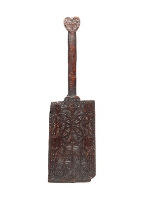 Lot 1385 - AN EARLY 17TH CENTURY WELSH CARVED WOOD LOVE TOKEN WASHING BAT
