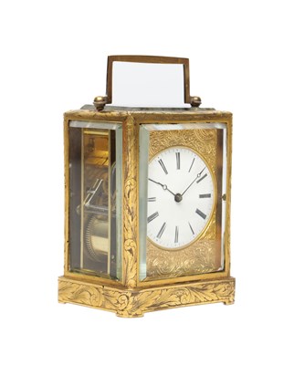 Lot 1223 - A 19TH CENTURY FRENCH ENGRAVED GILT-BRASS ONE-PIECE CASE STRIKING CARRIAGE CLOCK
