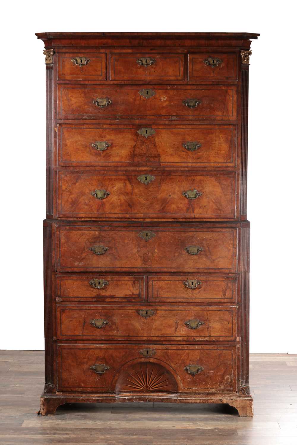 Lot 1688 - A GOOD EARLY 18TH CENTURY FIGURED WALNUT SECRETAIRE CHEST ON CHEST WITH STARBURST INLAID BASE