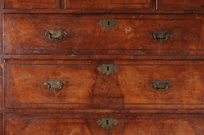 Lot 1688 - A GOOD EARLY 18TH CENTURY FIGURED WALNUT SECRETAIRE CHEST ON CHEST WITH STARBURST INLAID BASE