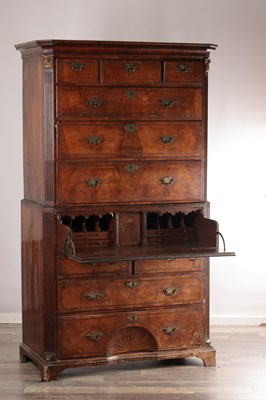 Lot 1688 - A GOOD EARLY 18TH CENTURY FIGURED WALNUT SECRETAIRE CHEST ON CHEST WITH STARBURST INLAID BASE
