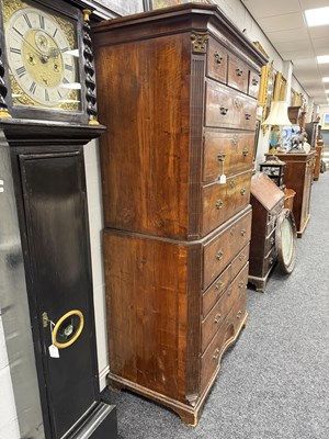 Lot 1688 - A GOOD EARLY 18TH CENTURY FIGURED WALNUT SECRETAIRE CHEST ON CHEST WITH STARBURST INLAID BASE