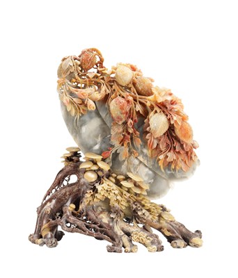Lot 772 - A CHINESE SOAPSTONE CARVING OF LYCHEE FRUIT AND FOLIAGE