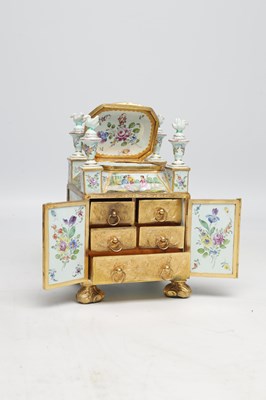 Lot 620 - A FINE AND RARE MID 19TH CENTURY VIENNESE ENAMEL AND ORMOLU MINIATURE CABINET IN ORIGINAL FITTED CASE
