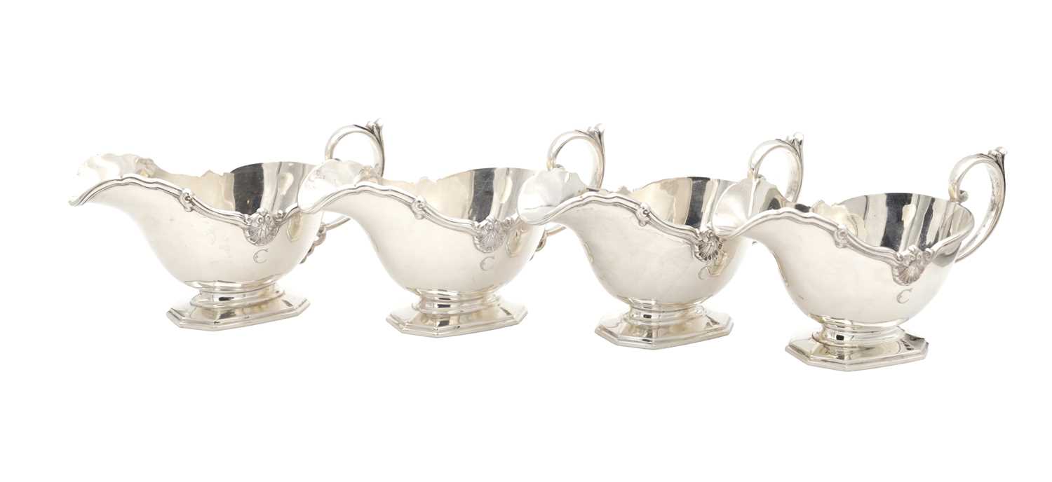 Lot 18 - A SET OF FOUR MID 20TH CENTURY ENGLISH SILVER SAUCE BOATS BY MAPPIN AND WEBB