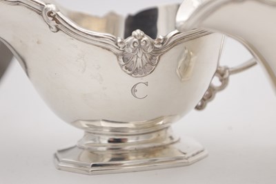 Lot 18 - A SET OF FOUR MID 20TH CENTURY ENGLISH SILVER SAUCE BOATS BY MAPPIN AND WEBB