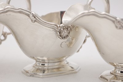 Lot 18 - A SET OF FOUR MID 20TH CENTURY ENGLISH SILVER SAUCE BOATS BY MAPPIN AND WEBB