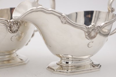 Lot 18 - A SET OF FOUR MID 20TH CENTURY ENGLISH SILVER SAUCE BOATS BY MAPPIN AND WEBB