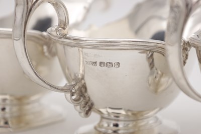 Lot 18 - A SET OF FOUR MID 20TH CENTURY ENGLISH SILVER SAUCE BOATS BY MAPPIN AND WEBB