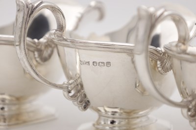 Lot 18 - A SET OF FOUR MID 20TH CENTURY ENGLISH SILVER SAUCE BOATS BY MAPPIN AND WEBB