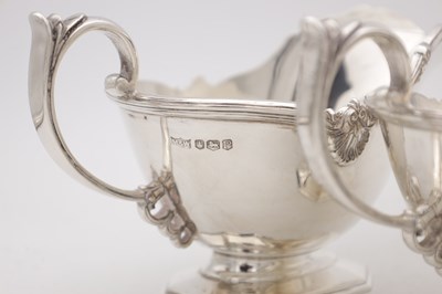 Lot 18 - A SET OF FOUR MID 20TH CENTURY ENGLISH SILVER SAUCE BOATS BY MAPPIN AND WEBB