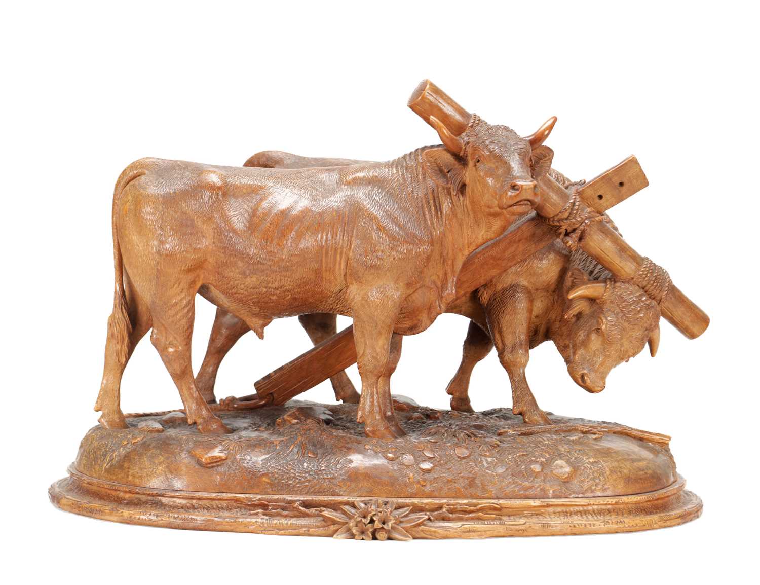Lot 1400 - ATT JOHANN HUGLER A SWISS BLACK FOREST CARVED WOOD GROUP OF YOKED OXEN ON OVAL BASE