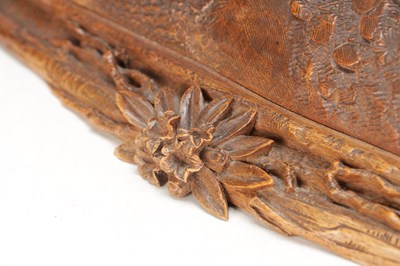 Lot 1400 - ATT JOHANN HUGLER A SWISS BLACK FOREST CARVED WOOD GROUP OF YOKED OXEN ON OVAL BASE