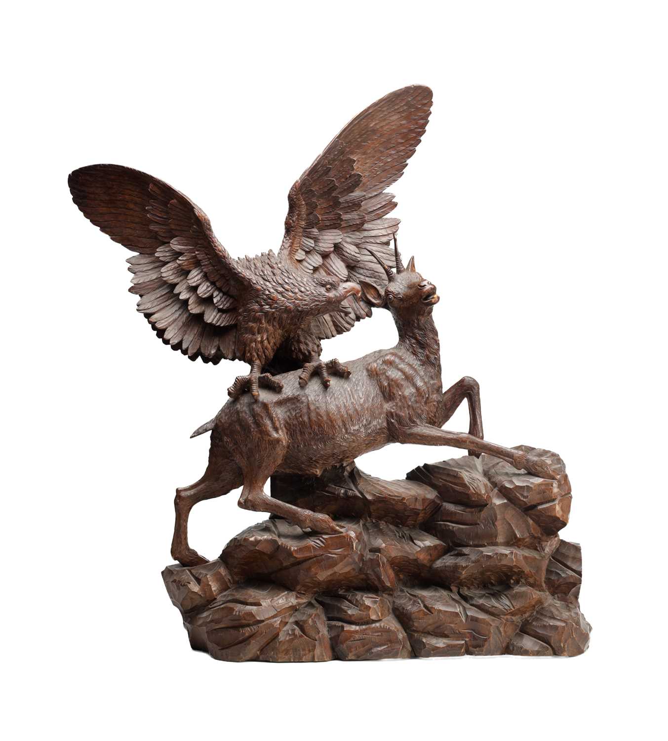 Lot 1391 - A LARGE AND IMPRESSIVE BLACK FOREST CARVED WOOD GROUP OF AN EAGLE ATTACKING A CHAMOIS