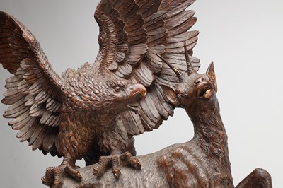 Lot 1391 - A LARGE AND IMPRESSIVE BLACK FOREST CARVED WOOD GROUP OF AN EAGLE ATTACKING A CHAMOIS