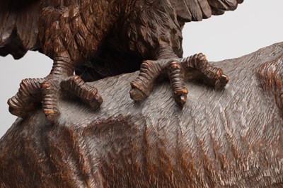 Lot 1391 - A LARGE AND IMPRESSIVE BLACK FOREST CARVED WOOD GROUP OF AN EAGLE ATTACKING A CHAMOIS