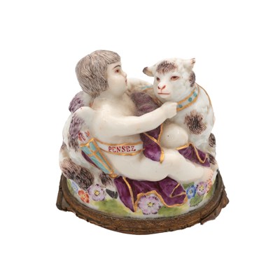 Lot 606 - A 19TH CENTURY FRENCH PORCELAIN FIGURAL BONBONNIERE MODELLED AS A PUTTO AND LAMB