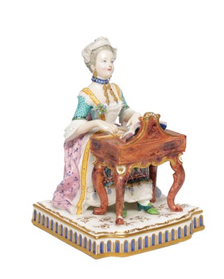Lot 600 - A 19TH CENTURY MEISSEN STYLE PORCELAIN FIGURE OF A SEATED LADY AT A WRITING DESK