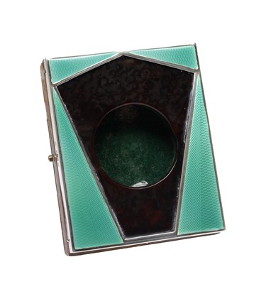 Lot 61 - AN ART DECO ENGLISH SILVER MOUNTED TORTOISESHELL AND GUILLOCHE ENAMEL POCKET WATCH HOLDER