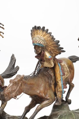 Lot 1097 - CARL KAUBA (AUSTRIAN, 1865-1922) A LARGE COLD PAINTED BRONZE FIGURAL GROUP OF NATIVE AMERICAN WARRIORS ON HORSEBACK