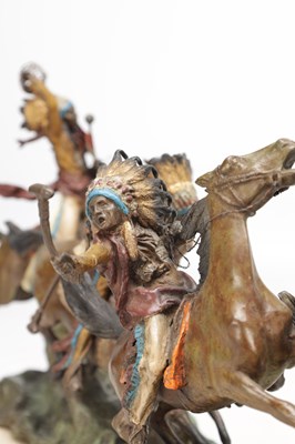 Lot 1097 - CARL KAUBA (AUSTRIAN, 1865-1922) A LARGE COLD PAINTED BRONZE FIGURAL GROUP OF NATIVE AMERICAN WARRIORS ON HORSEBACK