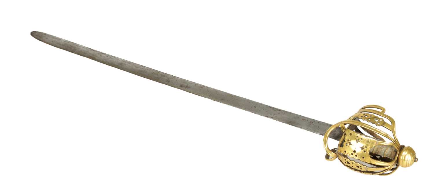 Lot 842 - AN 18TH CENTURY SCOTTISH BRASS HILTED BASKET-HILT SWORD