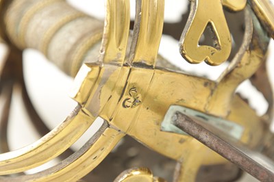 Lot 842 - AN 18TH CENTURY SCOTTISH BRASS HILTED BASKET-HILT SWORD
