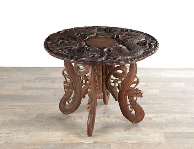 Lot 1661 - A CHINESE HARDWOOD DRAGON CARVED FOLDING OCCASIONAL TABLE