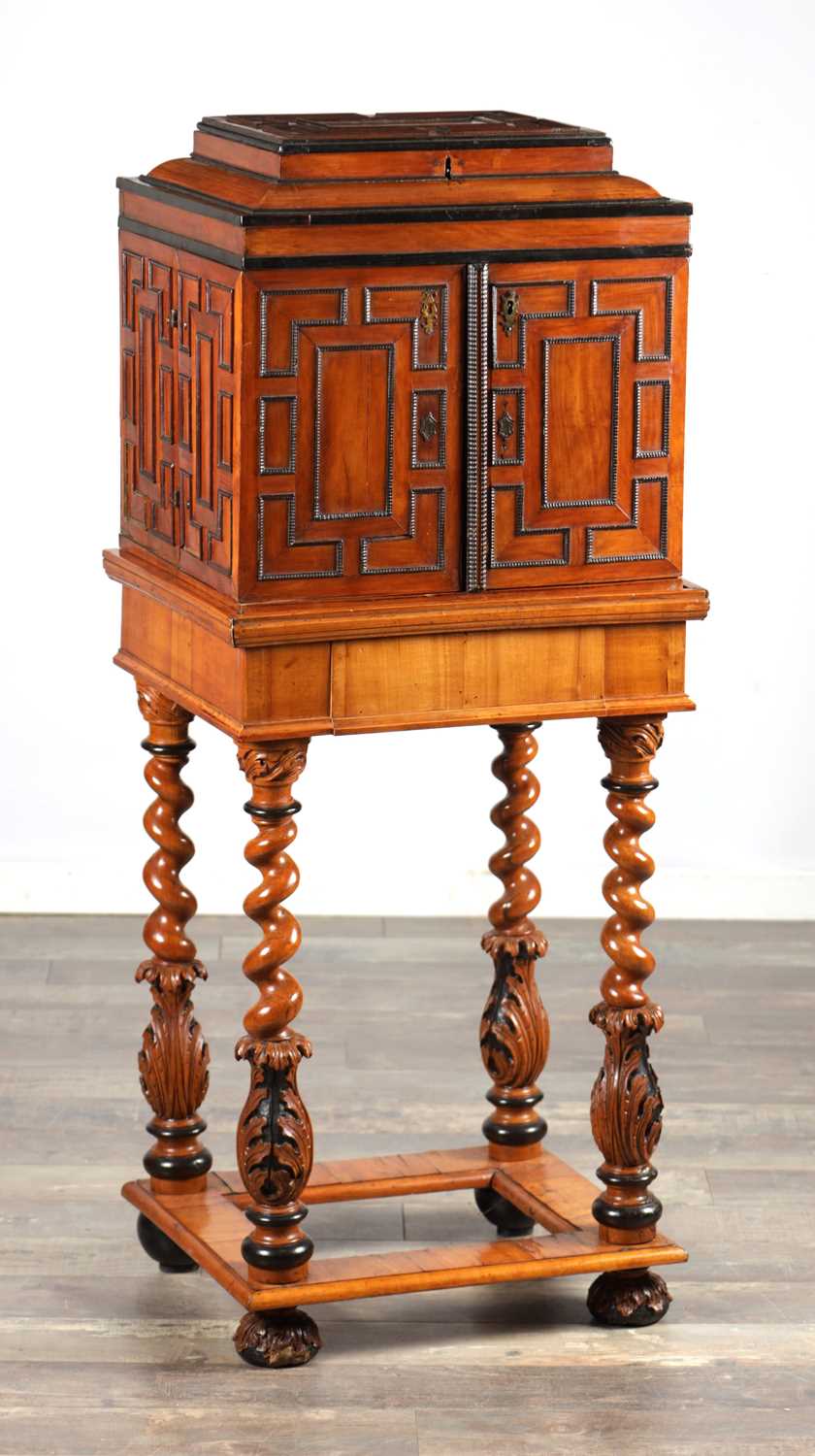 Lot 1683 - A FLEMISH WALNUT CABINET ON STAND