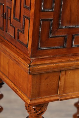 Lot 1683 - A FLEMISH WALNUT CABINET ON STAND