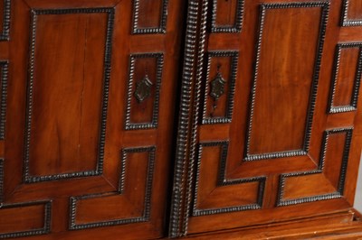 Lot 1683 - A FLEMISH WALNUT CABINET ON STAND